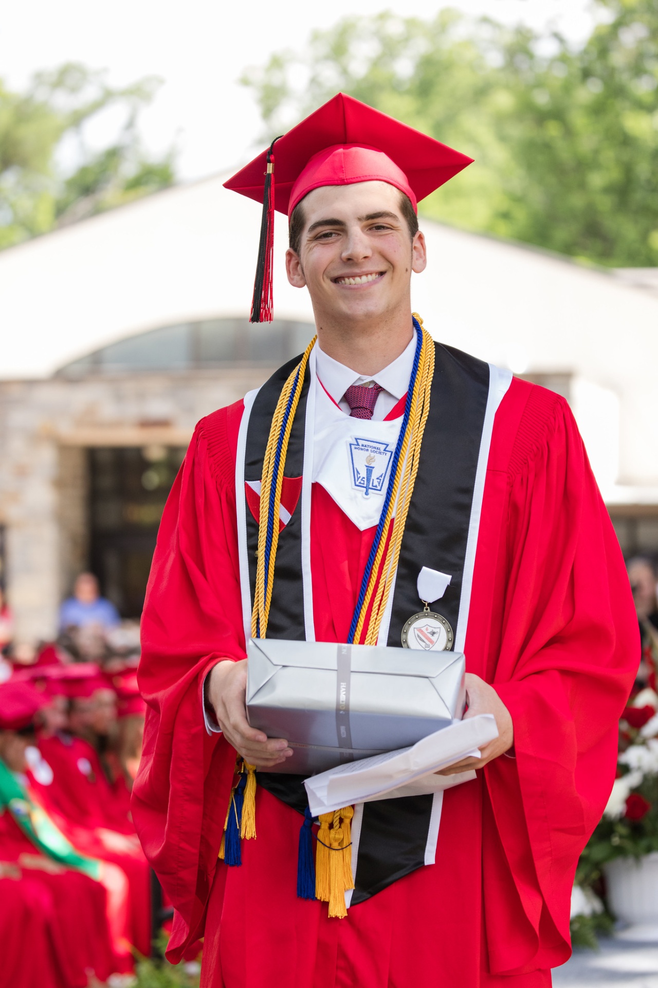 Brodie in graduation cap and gown